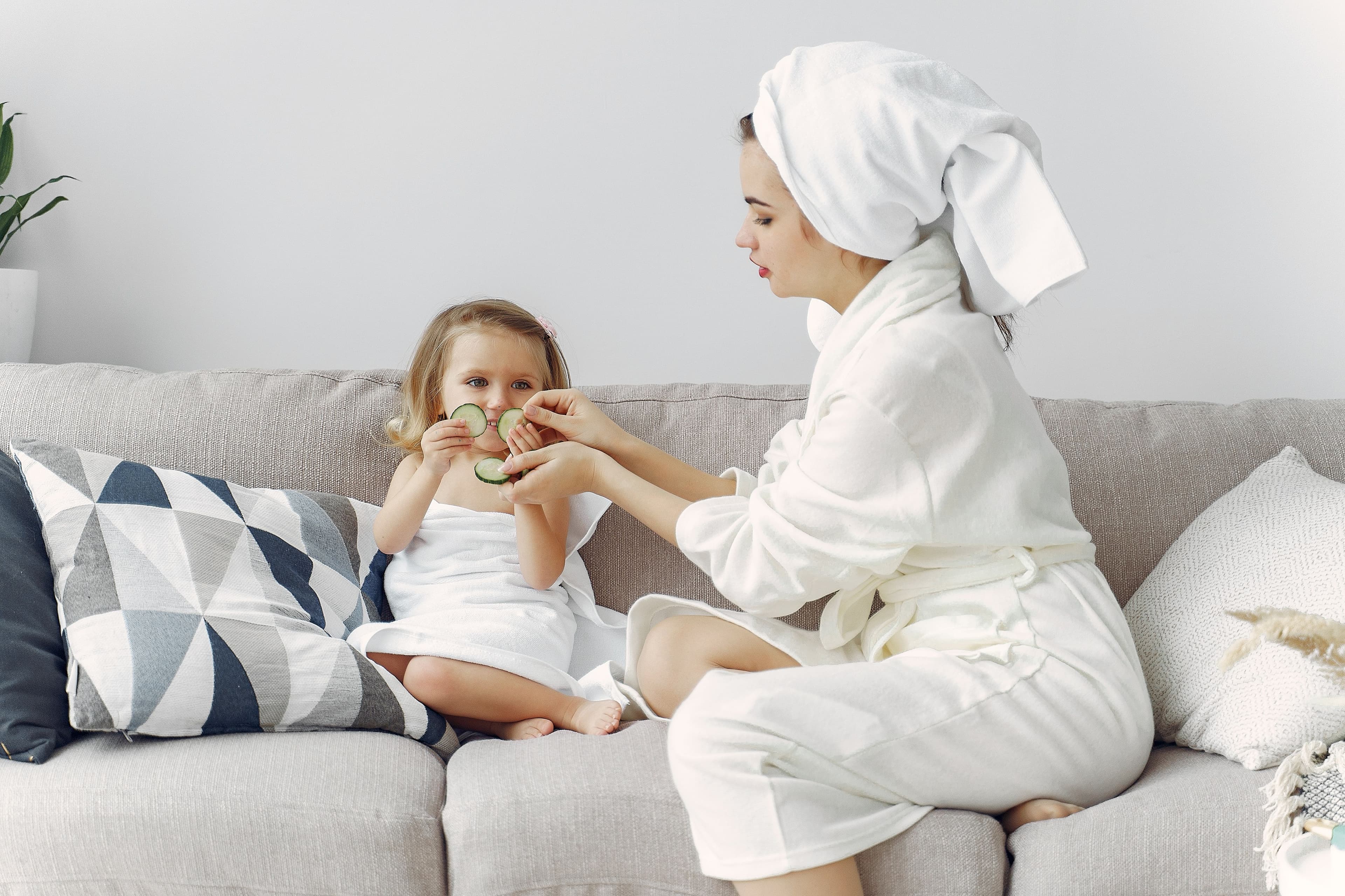 Gentle, fragrance-free skincare basics suitable for children arranged on a soft light surface