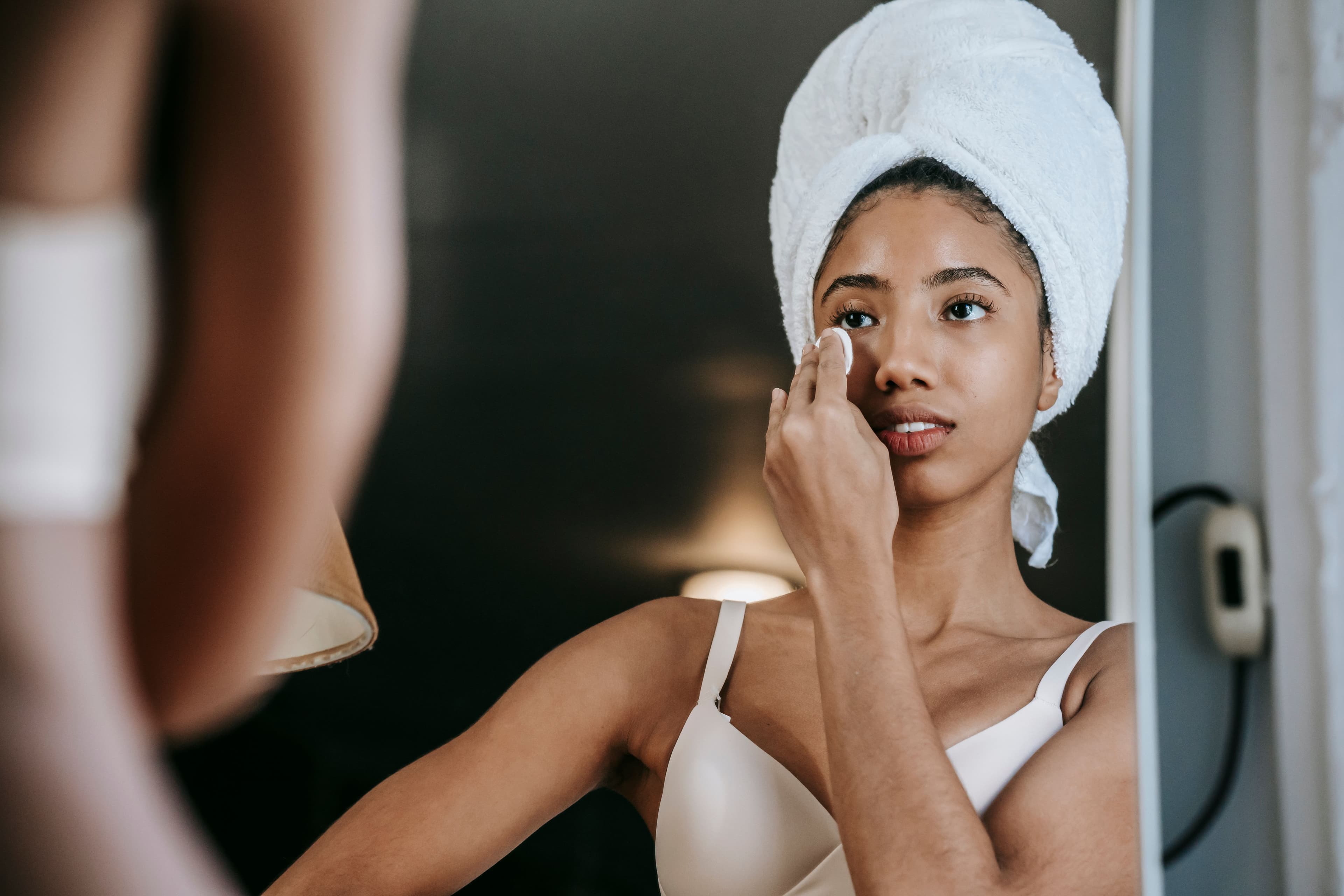 Lightweight gel skincare products for oily skin arranged on a marble surface