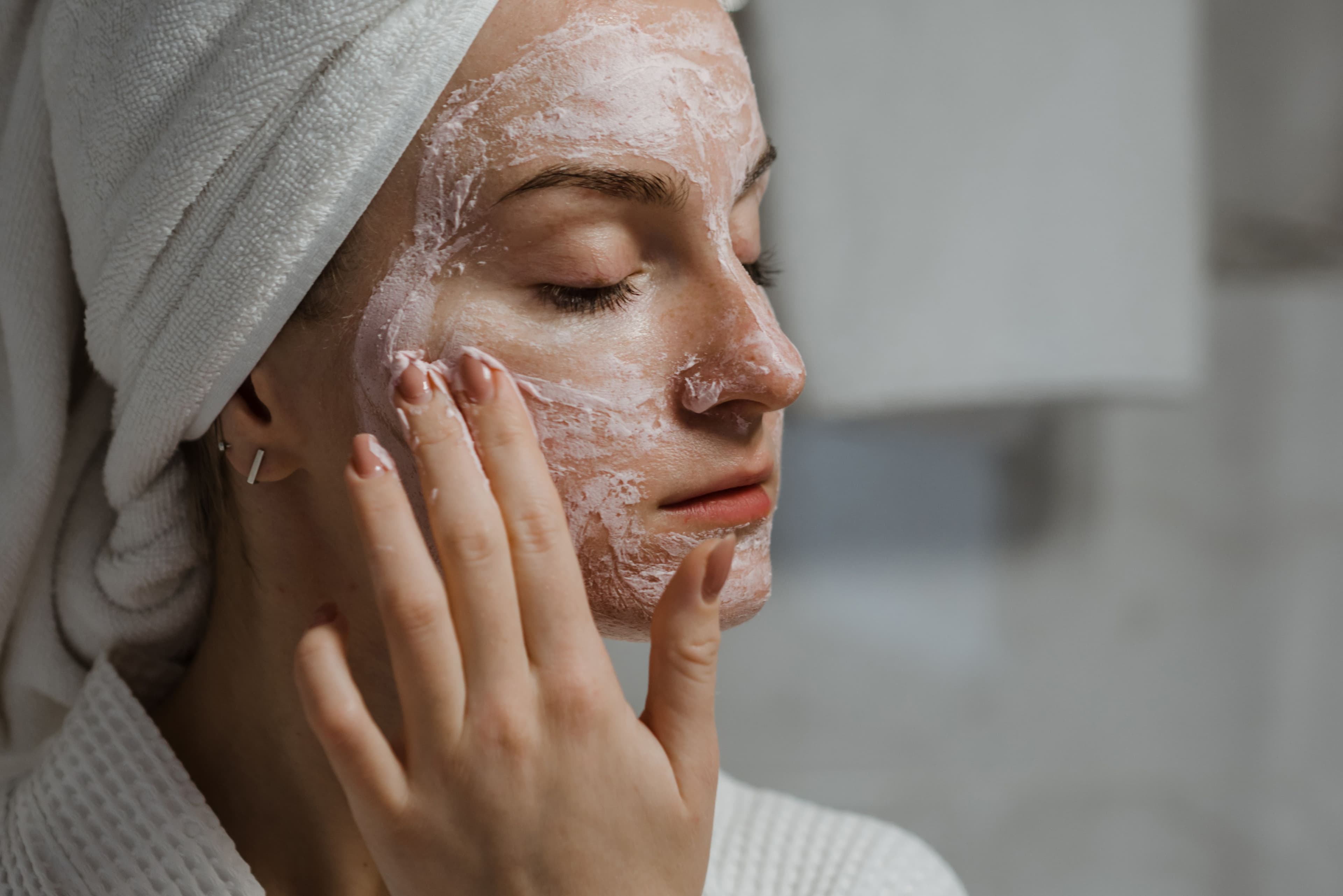 Close-up dermatological view of skin texture and visible pores on the cheek area