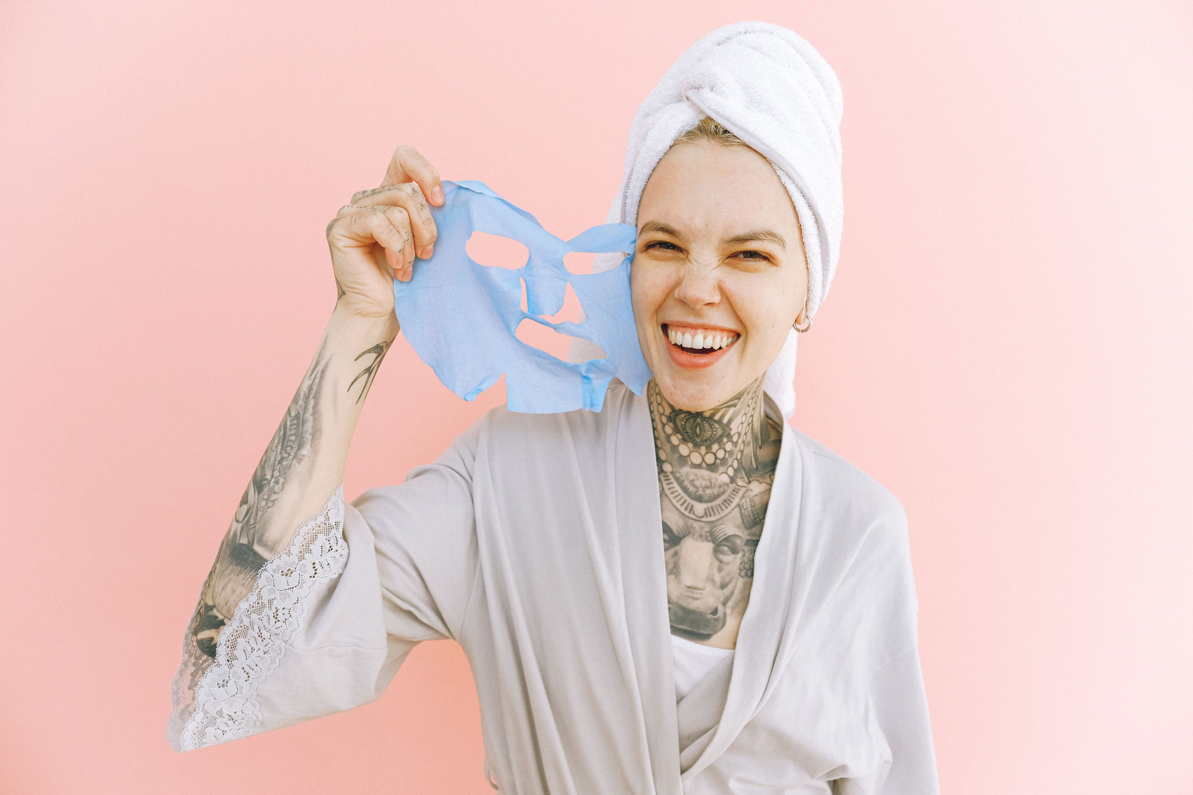 Lightweight summer skincare products including gel moisturizer and sunscreen on a bright background